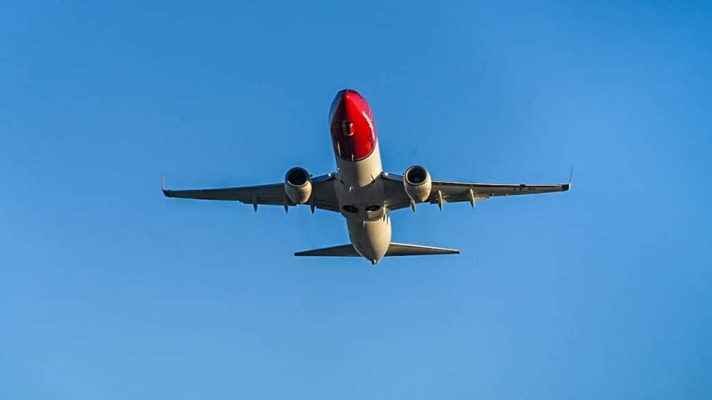 plane and blu skies departure take off